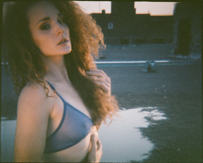 davidstrangephotography:  Found an old roll of film shot with the Diana and Cat Hedlund.