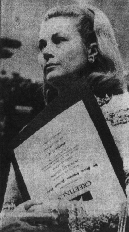 princessgracekelly1956: HONORARY CITIZEN - Princess Grace of Monaco holds a certificate naming her a