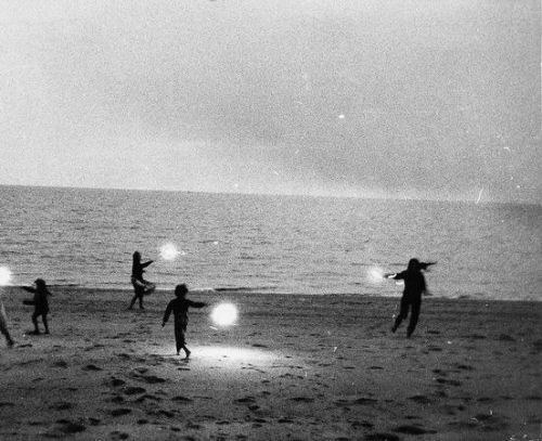 headless-horse:Untitled (Mary Frank and children with sparklers) - Robert Frank, 1958