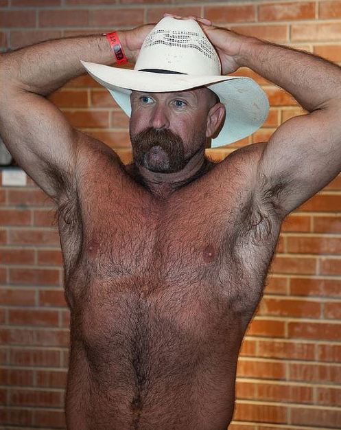 This cowboy is one stunningly handsome, hairy, sexy man and with an awesome beard - WOOF