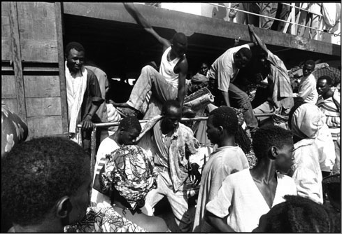 Kadir van Lohuizen: Niger - ocean to ocean (West Africa, 1996)The brown God runs from Guinee, very c