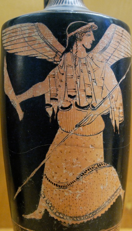 The goddess Nike, with a spear and a greave.  Attic red-figure lekythos, attributed to the Pain