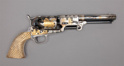 Gold and silver Colt Third Model Dragoon Revolver owned by western singer/actor Gene Autry.Decoratin