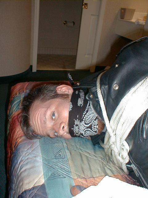 bubbabrando:  jhardcastle1976:  The best way to keep a guy in a leather biker jacket, tied up and his big mouth gagged  yes, it was quite effective. 