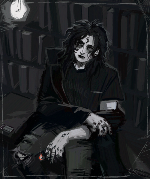 A digital painting of Gerard Keay, done in greyscale with one red accent. We see him from an angle slightly above, looking down. He’s in trad goth makeup, though it’s a little hard to tell because of the heavy shadows already falling over his eyes. His trench coat has fallen half off, only fully over one shoulder. He’s sitting on a bench, in front of a wall of bookshelves, spiderwebbed in places. A matchbox sits beside him, a lit match held between two of his fingers. His expression is dark: almost unreadable, but angry and reproachful. A single bare bulb hovers in the corner of the image, illuminating the scene.