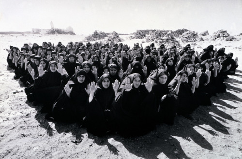 Rapture Series by Shirin Neshat, 1999.  Rapture consists of two projections shown on opposing g