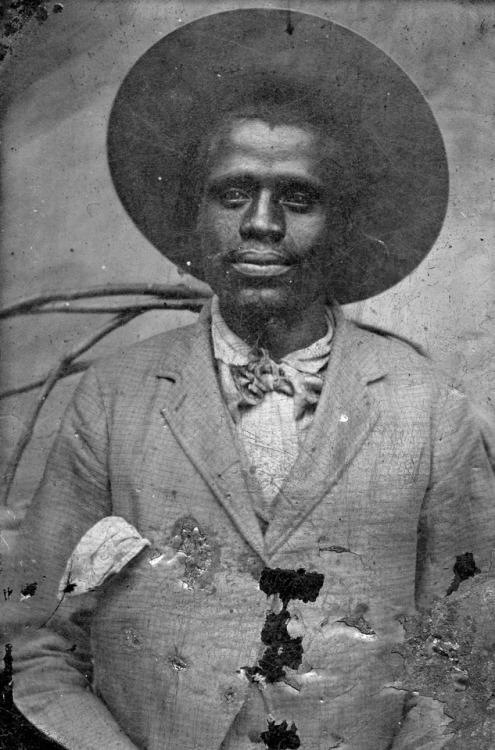 chubachus: Tintype portrait of an African American man wearing a hat, c. 1800′s Source: Nation