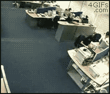 anna-earley:  death-by-lulz:  kevinguillermo: I love how the people at the desks don’t even acknowledge them like it happens all the time hahaha By far one of my favorite gifs  Oh gosh, I laughed so hard. This is the best office ever. 