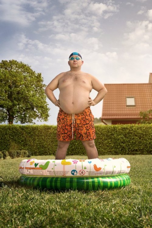 dangerously-ripe-fruit: Cheap holidays at home, funny overweight man about to swim in the back yard 