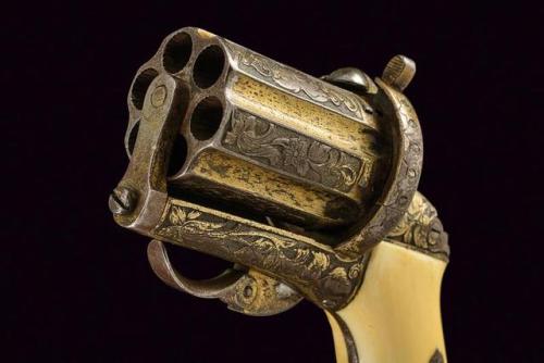 Engraved pinfire pepperbox revolver with ivory grips, produced by Chamelot-Delvigne of Paris, circa 