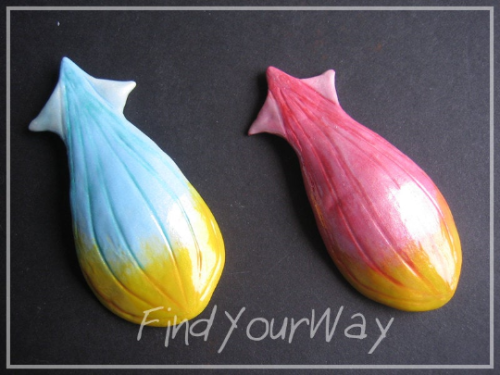 thalassa shell cosplay props.  sculpted from resin, painted with enamel.