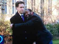 tryingtokeepitloki:  Lenny Henry hugging Ed Miliband! This is the best thing; I needed this. Oh god, his face. God bless English politics