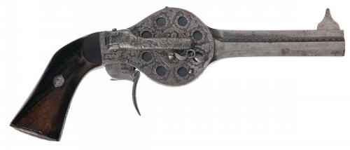 Rare engraved ten shot Noel turret revolver, originates from France, mid 19th century.Sold at Auctio