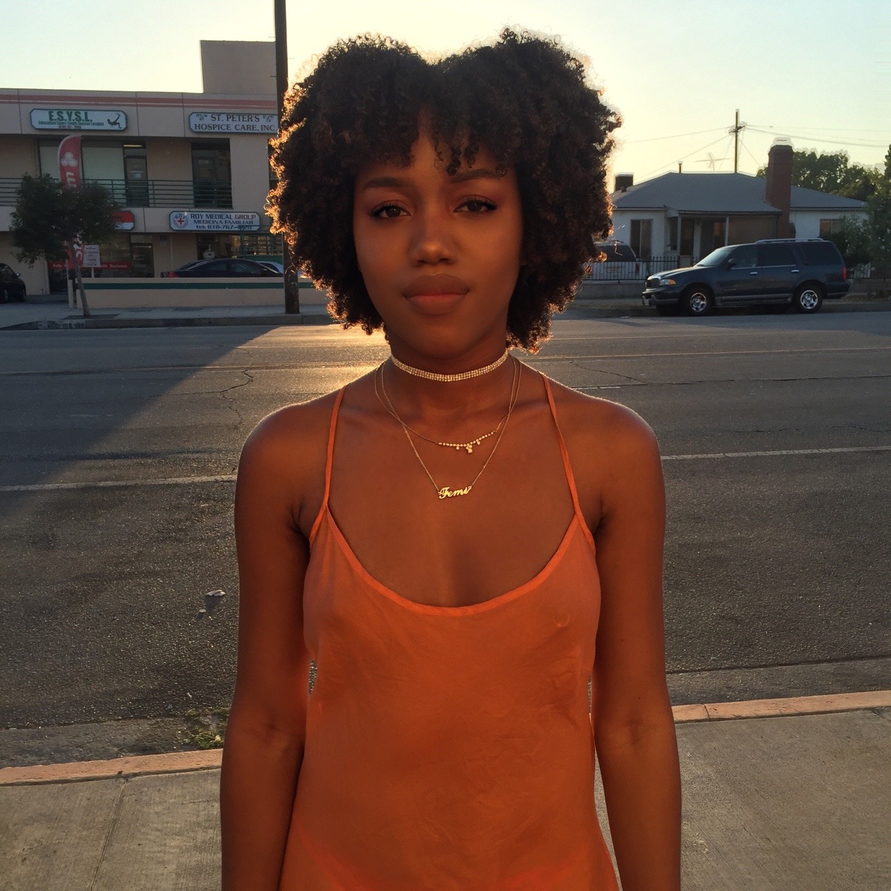 blackfashion:  Femi, 22, LA  Choker made by @oluwa-femi Dress thrifted  IG: oluwa.femi