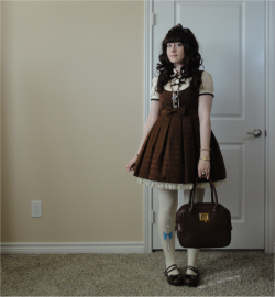 pinkstrawberrytea:  Yesterday was my birthday but I didn’t get to wear lolita, so I’m dressing up today 🍫💕  JSK: Royal Chocolate by Angelic Pretty Blouse: Pumpkin Cat  Headbow: Innocent World Bag: Angelic Pretty Accessories: Coach and offbrand