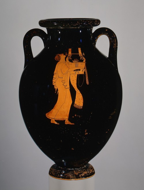 Terracotta amphora with a young man playing the kithara (top) and a judge (bottom), attributed to th