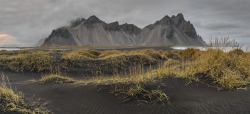 Exploreelsewhere:black Volcanic Sand Dunes On The Beach At Stokness, Iceland. By