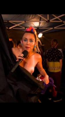 celebritiesuncensored:  Miley Cyrus Backstage Tits OutSource: Dirty Teen Celebs