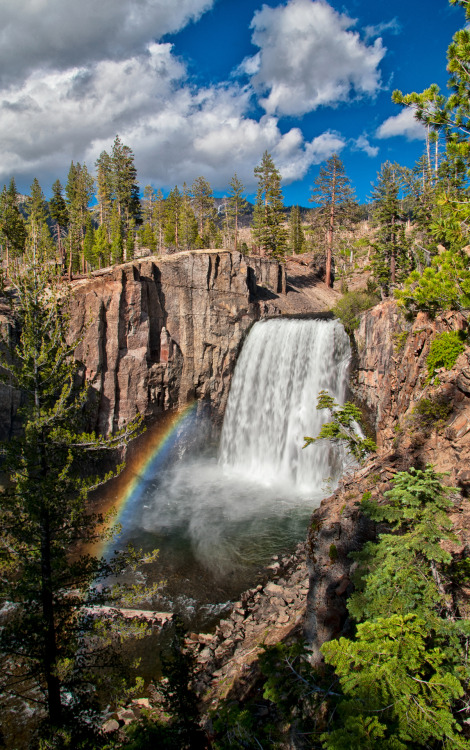 americasgreatoutdoors:  Happy St Patrick’s Day! Here’s a great pic of a #rainbow at the end of Devils Postpile National Monument’s iconic Rainbow Falls. Plunging 101-feet down to the turbulent water below, the falls are aptly named for the many