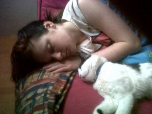 me and my boyfriends cat megatron both sleeping (boyfriend responsible for the picture)  (submi