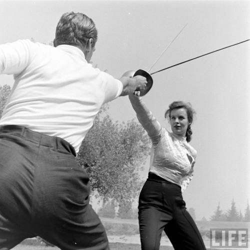 Douglas Fairbanks, Jr. fencing with Helena Carter(Loomis Dean. 1948)