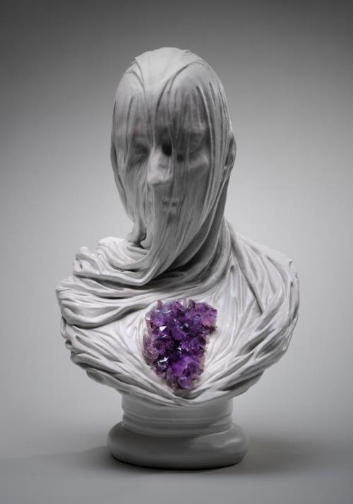 asylum-art:  The Veiled Ghosts of  Livio Scarpella The work of Italian contemporary artist Livio Scarpella turns good and evil into delicacy.  This group of sculptures, named “Ghosts Underground”, depicts lost souls anguishing beneath the effect