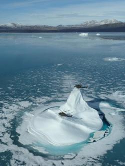 error888:  A pair of Canadian Griffon helicopters perch on an ice floe in the Arctic during the annual Operation Nevus, responsible for maintaining Canada’s northern comm links [1024x1365] : MilitaryPorn 