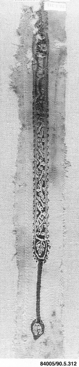 Fragment of a Tunic, Islamic ArtMedium: Wool, linen; plain weave, tapestry weaveGift of George F. Ba
