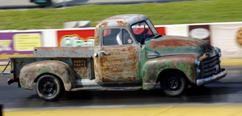 iamoceanic:stihlquinn:Gary Hart and his 1951 pickup loaded with a 302 Jimmy inline six and a homegro