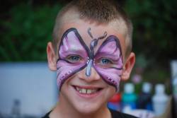 kiefharing:  lets take a minute to talk about how fucking badass my little cousin is? I was doing face painting at my niece’s third birthday party today, and my 9/10 year old cousin tyler was there. (he’s the awesome dude with a butterfly on his face)
