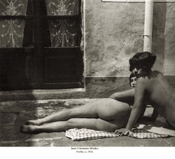  Two females reclining in the street from