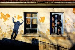 photosworthseeing: cemalsepici:   İntihar.. Dünyada en can alıcı konudur !   Such a wonderful cheerful picture. Love everything about it. The interaction of the shadow and the kids. The harmony of colours and the multiple framing. There´s no better