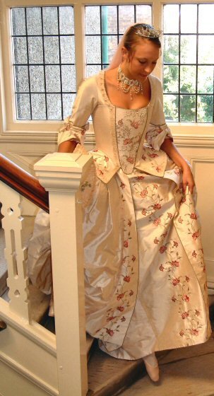 18th century style wedding dress in cloud pink regal dupion. This period style wedding gown consists