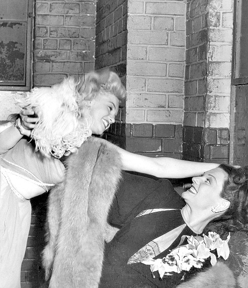 alwaysmarilynmonroe:  Rare photos of Marilyn having a cat fight in Ladies of The
