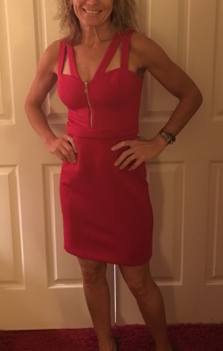 oregoncuckold:  My wife looks great in and out of the hot red dress that @dentistdave bought for her.  Oregoncuckold10-6-16