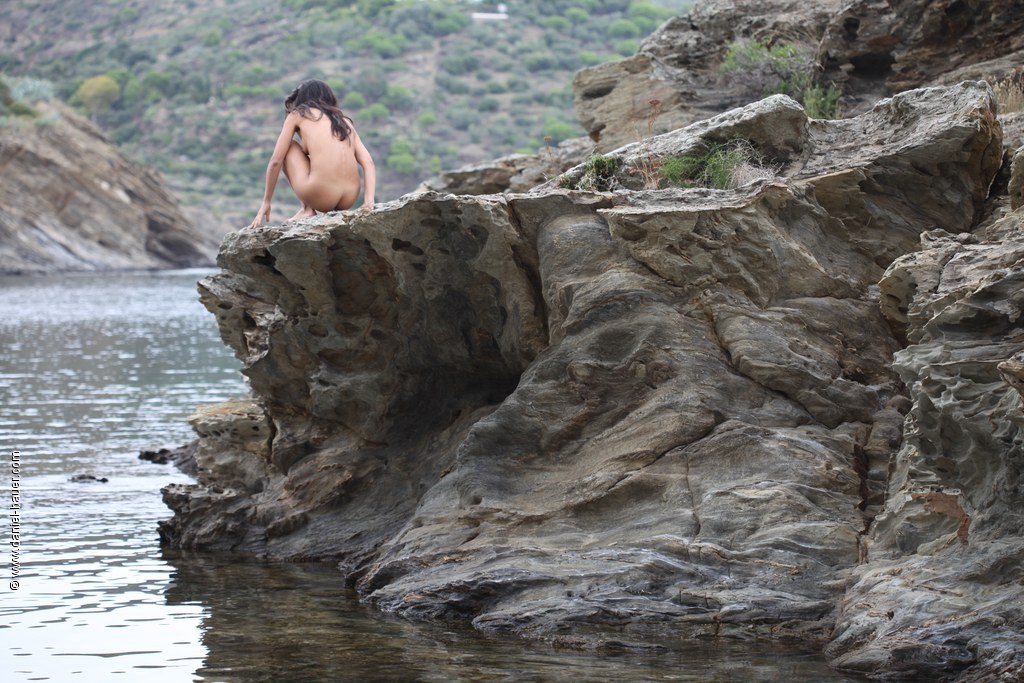 soft, young &amp; wild girl on the rough, old &amp; wild rocks of Cadaqués,