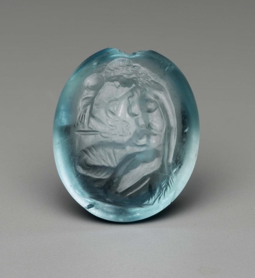 theancientwayoflife:~ Oval gem with Kassandra kneeling at the Palladion.Culture: GreekPeriod: Late H