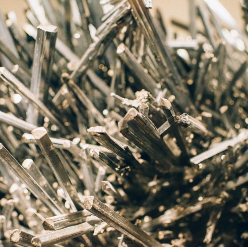 amnhnyc:  One of the Museum’s most spectacular mineral specimens is a 1,000-pound stibnite with hundreds of sword-like, metallic blue-gray crystals sprouting from a rocky base. Stibnite (Sb2S3), a compound of the elements antimony and sulfur, occasionally
