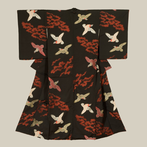 An omeshi silk kimono featuring birds on a black background. Mid-Showa period, 1940-1960, Japan. The