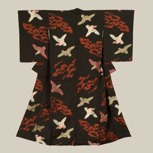 A thickish omeshi silk kimono featuring birds on a black background. Mid-Showa period (1940-1960), J