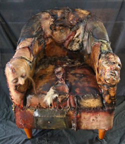 brokehorrorfan:Australian special effects company Slaughter FX sells a line of Ed Gein-inspired furniture that looks like it’s made from human flesh and body parts. This one-of-a-kind lounge chair is priced at ũ,999.The detail is remarkable, although