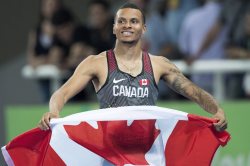 downworlderdanceparty:  Andre De Grasse is a national treasure pass it on. (Frank Gunn photo) 