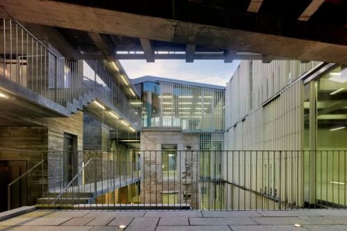archatlas:       Property Registration Offices in Spain  Property Registration Offices by Irisarri Piñera Arquitectos seeks a balance between a joint organization, and not give up the presence of clustered buildings, between get a sense of unitary