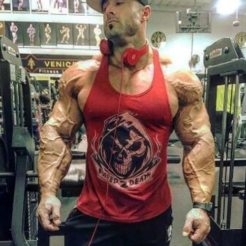 sannong:Classic Frank McGrath at his peak freakiest. The God of arm vascularity and size.