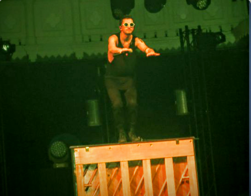 weirdpicturesoftylerjoseph:tyler joseph thinks the audience needs more exercise, so he leads them ou