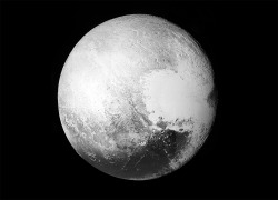 ohstarstuff:  Higher-Resolution Images of Pluto Finally ArriveTwo months after the New Horizons spacecraft flew by the dwarf planet, higher resolutions images are finally arriving. The crisp, detailed images are spectacular but are also creating some