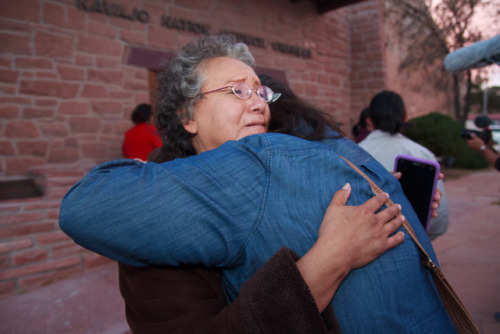 Rita Bilagody embraces another special session attendee in relief after the defeat of the Grand Cany