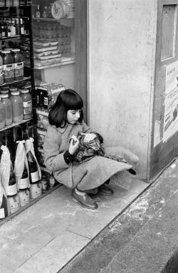 hauntedbystorytelling:    David Hurn ::   Young girl with cat in central Paris, 1980 / source: Magnum Photos   more [+] by this photographer    