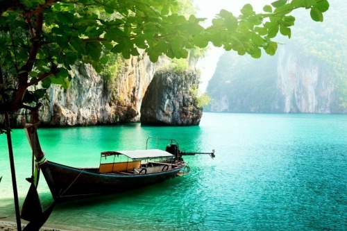 Maya Bay Thailand Private Long Tail Boat in Maya Bay, near the Maya Beach Thailand. Photo by George 