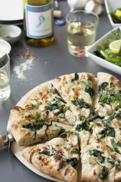 food52:  Spinach, Garlic and Chicken Chardonnay White Pizza via The Candid Appetite Get your pizza on (and eat some spinach while you’re at it).